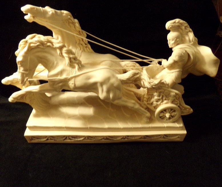 A Santini Resin Sculpture: Ben Hur: A Santini Resin Sculpture: Ben Hur. Base is 16 1/8 x 5 7/8. Roman in chariot pulling back on horses reigns.