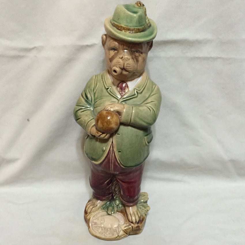 German Majolica Bull Dog Bulldog Bowling Decanter: A German Majolica bowling bull dog / bulldog liquor or whiskey decanter c.1890 Designed as a cigar smoking bulldog wearing a green jacket, pale red trousers and an Alpine hat on his head and readying 