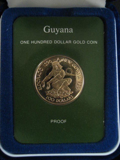 Guyana 1976 one hundred dollar gold coin in origi: Guyana 1976 one hundred dollar gold coin in original box.