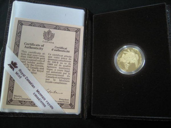 Canadian 1989 one hundred dollar gold coin in or: Canadian 1989 one hundred dollar gold coin in original case.