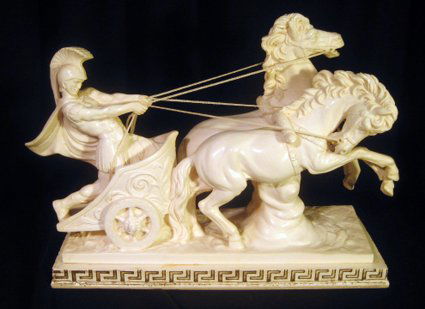 A. Santini composition sculpture, Roman warrior i: A. Santini composition sculpture, Roman warrior in chariot with horses, 14" long.