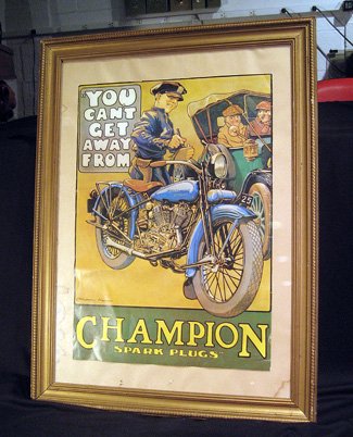 Modern framed poster by Malcolm Fowler: Modern framed poster by Malcolm Fowler for Champion Spark Plugs with NY City police officer on Harley Davidson motorcycle, 31-1/2" x 23-1/2" overall.
