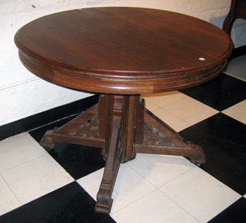 Antique Victorian Walnut Pedestal Dining Table 7 Chairs: Victorian walnut round top pedestal dining table, measuring 30" high, 40" diameter, with five 11" leaves and 7 walnut Victorian side chairs with caned seats.