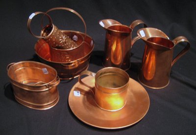 12 pc Copper Items by Michael Bonte: Large collection of miscellaneous copper by Michael Bonte: 3 plates, 2 heart-shaped cookie cutters, 2 pitchers, long-handled basket, grater, miniature copper boiler, round two-handled bowl and 1 three