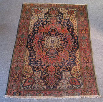Antique Sarouk Farahan 1890's Rug: Antique Sarouk Farahan 1890's ORIGIN: Iran MATERIAL: wool COLORS: blue, orange, Ivory DETAILS: hand-knotted, approx. 140kpsi SIZE/DIMENSIONS: 4' x 5'10"