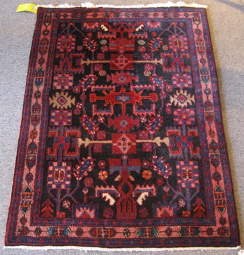 Persian Zanjan Rug: Persian Zanjan Rug ORIGIN: Iran MATERIAL: Wool COLORS: navy, ivory, red, and others DETAILS: hand-knotted, village rug, near Hamedan SIZE/DIMENSIONS: 3'9" x 5'5"