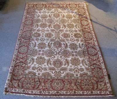 Persian Agra Design Rug: Persian Agra Design Rug ORIGIN: India MATERIAL: wool COLORS: rusty red, ivory, green DETAILS: "hand-knotted, Agra (Indo for garden) Design Inspired by 19th Century Agra designs, the Old World Collecti