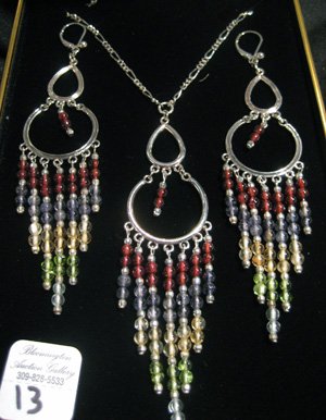 Sterling silver chandelier necklace & earrings: Sterling silver Aquamarine, Peridot, Citrine, Iolite and Garnet chandelier necklace on a sterling silver Figaro chain with matching chandelier earrings.