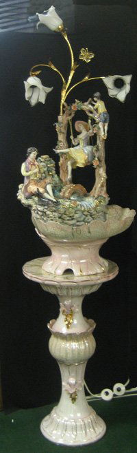 Large Lorenzou Italian Capodimonte Style Fountain: STUNNING large Lorenzou Italian Capodimonte style porcelain fountain, elaborate figural group with seated man playing horn and woman on swing, with upper lighting fixture and electrified fountain on p