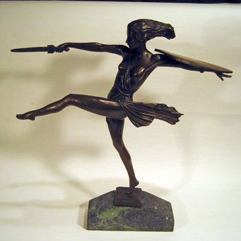 Modern bronze figural statue signed Pierre Le Faguays: Modern bronze figural statue of semi-nude woman with sword and shield, signed Pierre Le Faguays, on green marble base, 20-1/2" high, 20" wide.