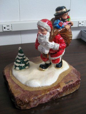 Limited edition Ron Lee clown figurine: Ron Lee limited edition clown figurine, "Bummin' a ride with Santa", #L586, #25/1950, 7" high.