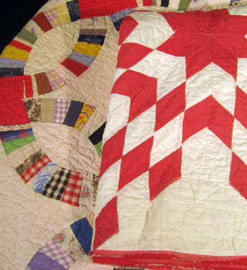 Two hand made quilts: red to white star & wedding ring: Two hand made quilts: red to white decorated with star pattern, 78" x 80" overall - border damaged and multi-colored wedding ring pattern, 72" x 81" overall.