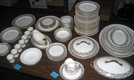 79 pcs Limoges porcelain dinnerware: Limoges dinnerware: two dinner plates, twelve luncheon plates, twelve salad plates, five bread plates, four cereal bowls, six saucers, seven demi-tasse cups, eleven saucers, four sauce dishes, four so