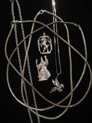 Three sterling silver necklaces & three sterling pendan: Three sterling silver necklaces and three sterling silver pendants - two unicors and one wizard.