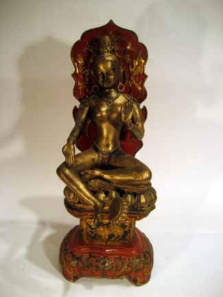 Brass metal statue of nude Eastern Indian woman: Brass metal statue of nude Eastern Indian woman seated on hand carved wooden pedestal base AGE: Antique MARKINGS: CONDITION: SIZE: statue 16" h, stand 8" h