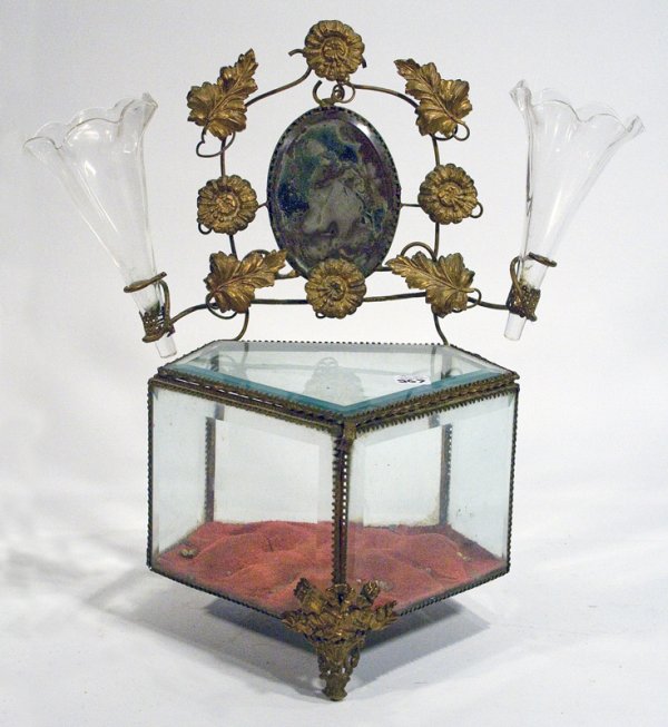 Beveled glass lidded jewelry box: Beveled glass lidded jewelry box with mirrored back panel and clear glass vases at each side AGE: Antique SIZE: 13" high, 14" wide