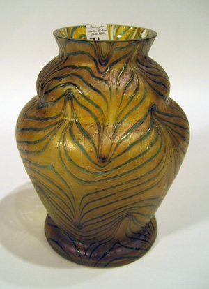 Loetz style green glass vase: Loetz style green glass vase, 7.5" high - chip on rim.