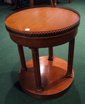 Thomasville walnut round side table with lower shelf: Thomasville walnut round side table with lower shelf, 18.5" high, 16" diameter.