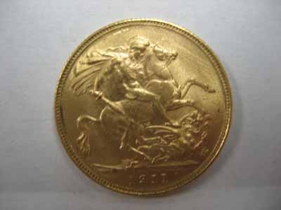 1911 British Gold Sovereign Coin: 1911 British gold sovereign coin. 7 grams.