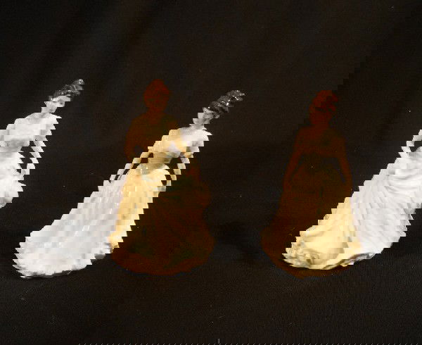 Two Royal Doulton figurines: Two Royal Doulton figurines: Harmony H.N 4096 and Melody H.N 4117. With original boxes. both 6" high.