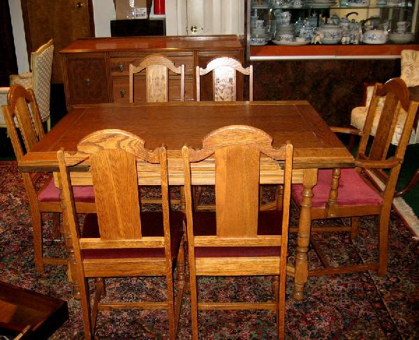 Oak dining set: table, 6 chairs & side board: Oak dining set: dining table, 30" high, top 38" x 54" overall with pull out leaves, 5 side chairs, 1 arm chair and matching side board, 37" high, 59.5" wide.