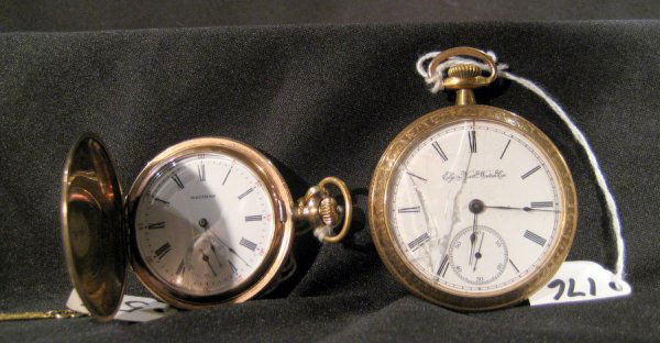 Two pocket watches: Elgin & Waltham: Two pocket watches: Elgin open face pocket watch, movement marked #5694849 - crystal cracked and Waltham hunting case pocket watch, movement marked #10491857 in gold filled case.