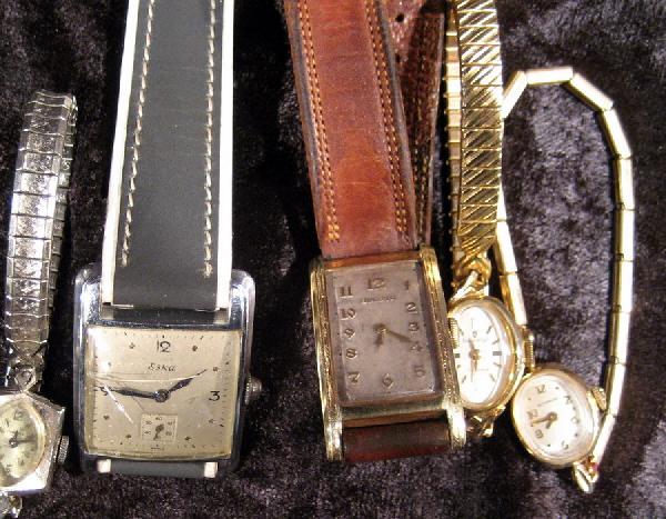 Five Miscellaneous Wrist Watches: Five miscellaneous wrist watches: ladies 1950's yellow metal manual Whittnauer watch; man's 1930's yellow metal manual 17 jewel Bulova rectangular watch , marked 8-10K gold filled case, #7484967, with