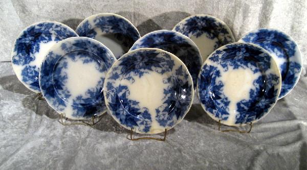 Collection of Sarreguemines, "Bryonia" pattern: Collection of Sarreguemines, "Bryonia" pattern blue and white: 2 soup plates, 9.5" diameter; 6 plates, 9.75" diameter - 2 cracked, 1 chipped.