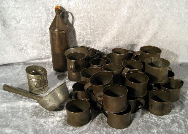 Miscellaneous Tin: Miscellaneous tin including measuring cups, two candle stands and tin bottle.