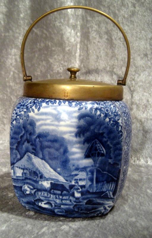Minton "Ye Olde Foley Ware" Biscuit Jar: Minton "Ye Olde Foley Ware" blue and white biscuit jar decorated with landscapes, 6" high, 5" diameter.