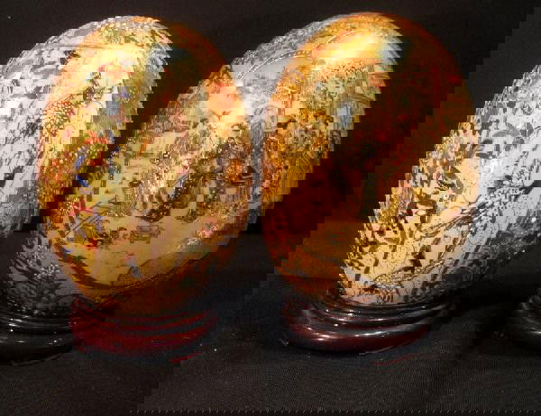 Two Satsuma Decorative Eggs on Wooden Stands: Two Satsuma decorative eggs on wooden stands: one decorated with figures and one decorated with bird bath - both 7.5" high overall. Age: vintage.