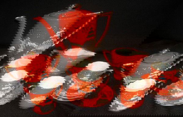 Japanese Moriage Porcelain Tea Set: Japanese Moriage porcelain tea set: teapot, 5 cups, 4 saucers, lidded sugar and creamer. Age: vintage.