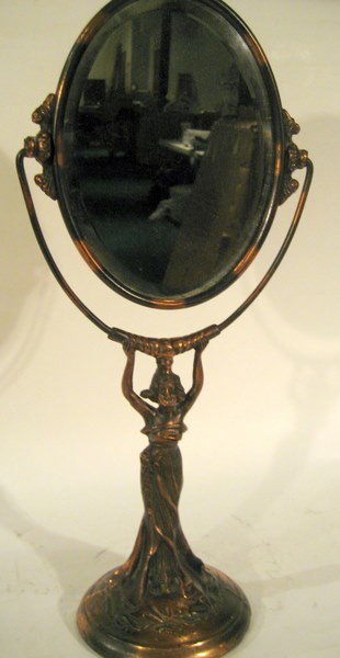 Early Metal Dresser Mirror with Art Deco Woman : Early metal dresser mirror with figural Art Deco woman support with beveled glass mirror - 17.75" long - Antique