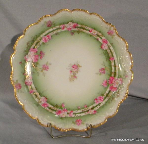 Limoges Coronet Round Changer decorated with Hand Pain: Limoges Coronet Round Changer decorated with Hand Painted and Flowers Leaves. 11.75" Diameter- Antique