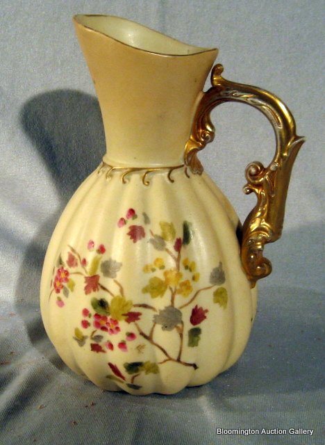 Royal Worcester Porcelain Pitcher: Royal Worcester porcelain pitcher decorated with flowers and gilded handle, 6.5" high - Antique