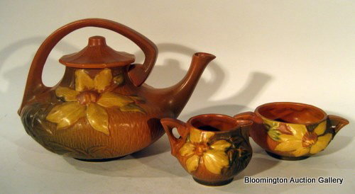 Roseville pottery "Clematis" pattern Tea Set: Roseville pottery "Clematis" pattern tea set: teapot, matching sugar and creamer. Teapot 7.5" high, sugar 2.5" high, creamer 3" high.- Vintage ***PLEASE NOTE, EXPRESS SHIPPING AVAILABLE FOR THIS ITEM: