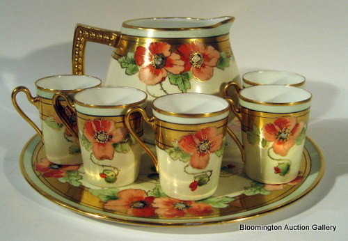 7 pc Bavarian Porcelain Lemonade Set, signed Revry: 7 piece Bavarian porcelain lemonade set, signed Revry, decorated with flowers and gilded handles including pitcher, undertray & 5 cups - vintage - pitcher 6"h, tray 14" diameter ***PLEASE NOTE, EXPRES