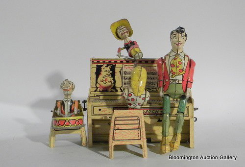 Unique Art Tin Toy Dogpatch Band at Piano: Unique Art Tin Toy Dogpatch Band at Piano- Working Condition- Vintage ***PLEASE NOTE, EXPRESS SHIPPING AVAILABLE FOR THIS ITEM: For an additional handling fee of $15.00, this item will be shipped with