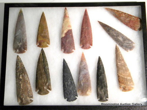 12 Native American Indian Arrowheads in display case: Twelve Native American Indian Arrowheads in glass top display case- Modern ***PLEASE NOTE, EXPRESS SHIPPING AVAILABLE FOR THIS ITEM: For an additional handling fee of $15.00, this item will be shipped