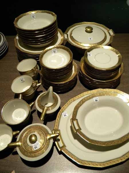 61 Pc Limoges Dinnerware: Limoges dinnerware: 9 dinner plates, 8 salad plates, 8 soup bowls, 8 bread plates, 8 sauce dishes, 7 cups, 8 saucers, round lidded tureen, oval vegetable dish and platter, lidded sugar and creamer (1 