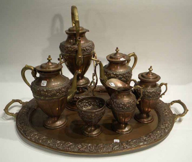 Mexican Coffee/Tea Set: Mexican copper coffee/tea set: 2 coffee pots, teapot on warming stand, sugar, creamer, lidded urn and tray.