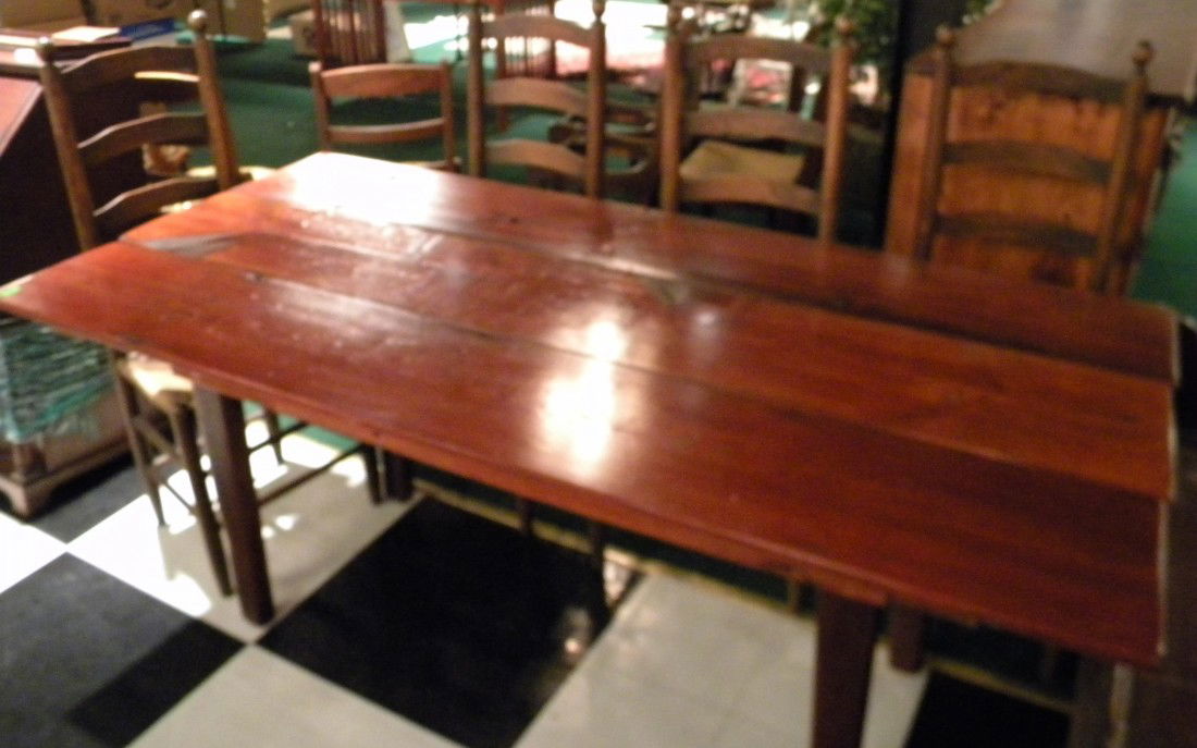 Lincoln Style Pine Kitchen Table w/4 Ladder Back Chairs: Lincoln style pine wide board knotted kitchen table, 30" high, top 72" x 35" overall with 4 ladder back chairs with woven rush seats. Some damage in the rushing on chairs. Vintage