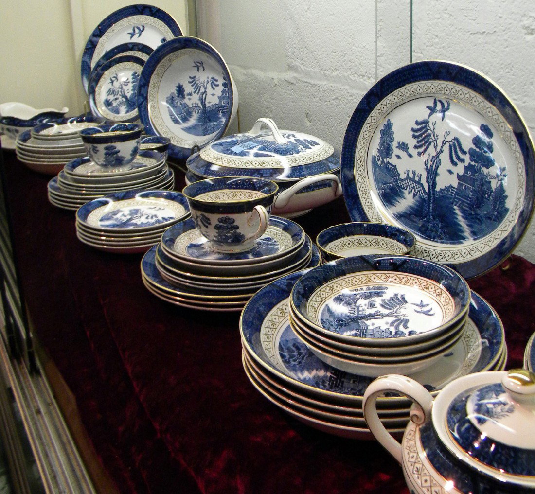 55 Pcs Occupied Japan "Blue Willow" Pattern Ironstone W: Ironstone Ware, "Blue Willow" pattern with gold trim, Made in Occupied Japan: 10 dinner plates, 9 soup plates (1 yellowed), 9 luncheon plates, 8 bread plates, 4 cups, 9 saucers, creamer, lidded sugar 