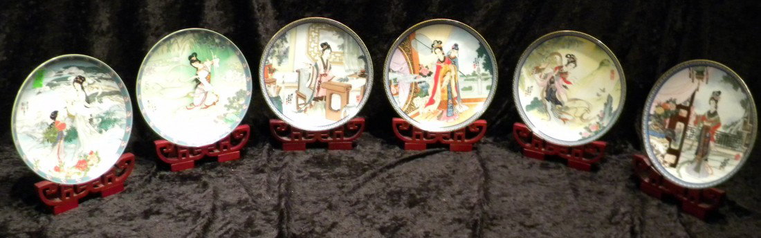 6 Imperial Jingdezhen Porcelain Plates w/Oriental Women: 6 Imperial Jingdezhen Porcelain collector plates, decorated with Oriental Women, on wooden display stands: 1985, 1986, 1986 (different decoration), 1987, 1989, 1990.