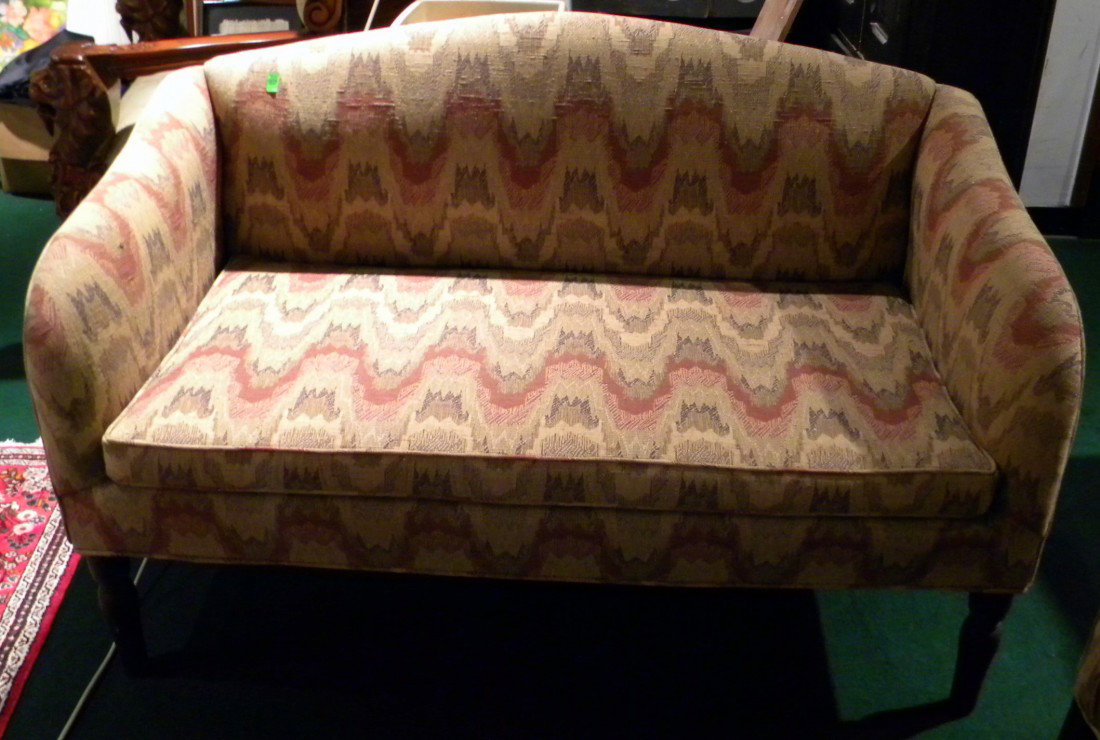 Upholstered "Amhurst" Settee (The Seraph): Upholstered "Amhurst" Settee by "The Seraph" with beige, rust brown flambe pattern fabric, 56" long. GOOD CONDITION ***Shipping Arrangements: DUE TO THE LARGE NATURE OF THIS ITEM, IT IS THE BUYER'S RE