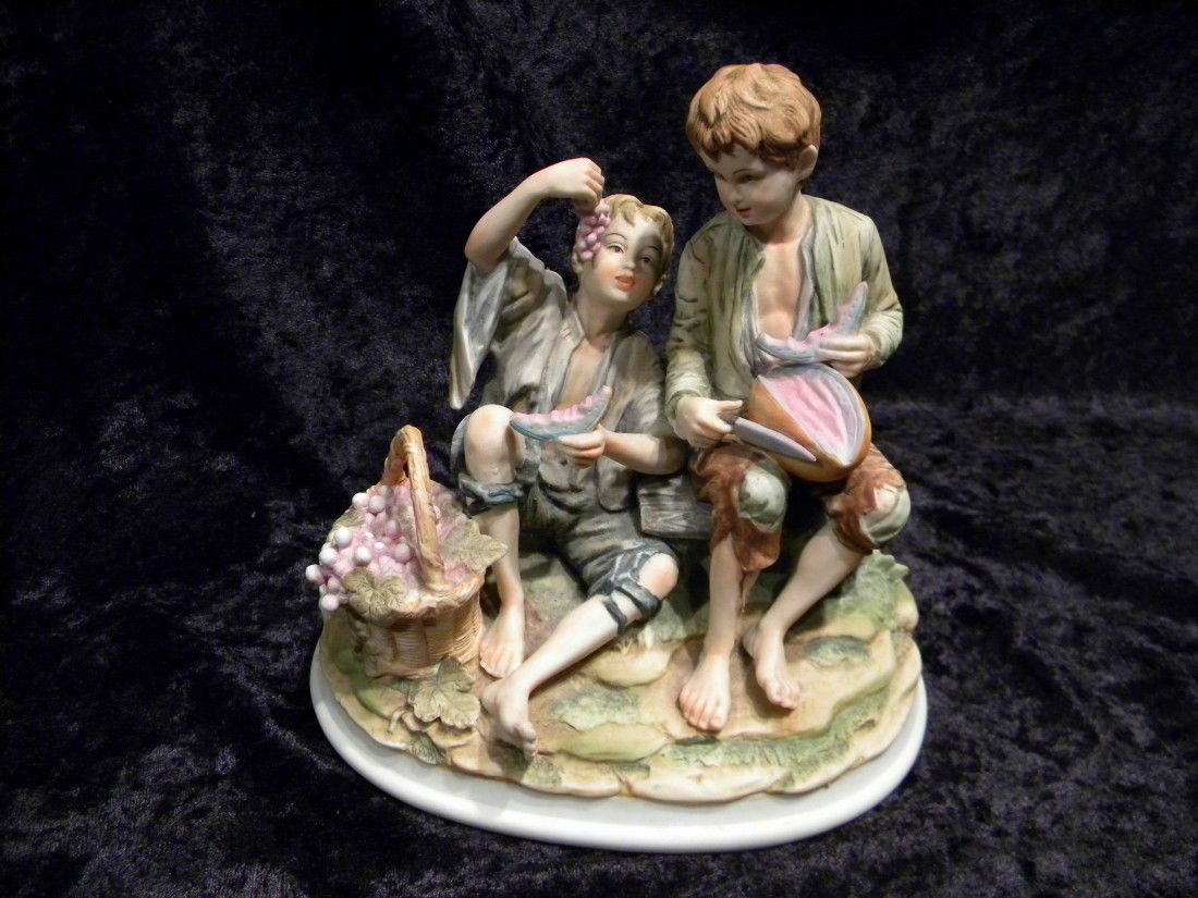 Hand Painted Lefton China Figurine #KW4048: Hand painted Lefton China figurine, two boys eating fruit, marked KW4048 on base, 6" high.