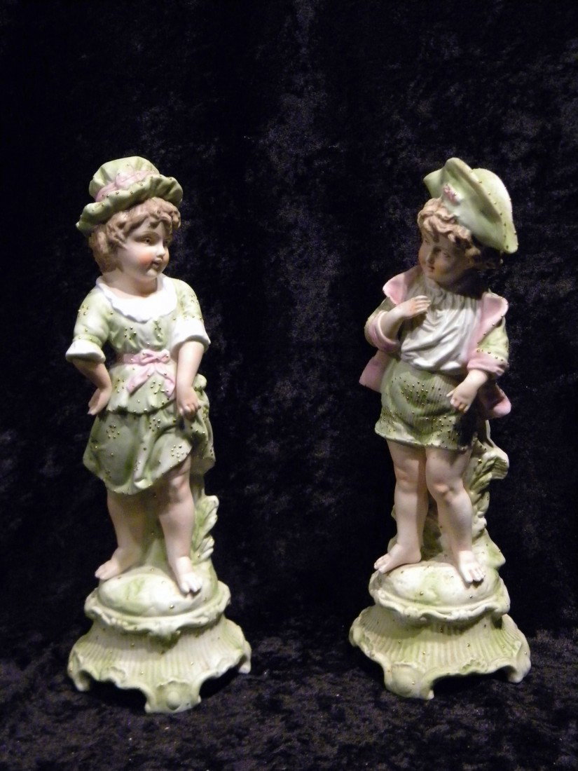 Pair Porcelain Statues, French Provincial Boy & Girl: Pair porcelain statues, French Provincial style boy & girl, 12" high.