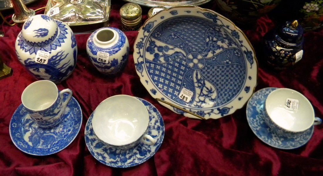 6 Japanese Porcelain Blue & White Items: 6 Japanese porcelain items: 3 tea cups, plate, 2 ginger jars (1 w/lid).