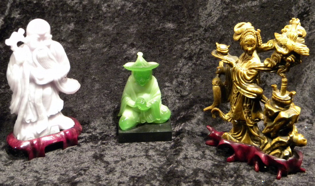 3 Japanese Carved Figurines on Wooden Bases: 3 Japanese figurines on wooden bases: brown carved stone figure of Geisha - 8" high; green Jadite figure of man with globe - 5" high and lavender Jadite of old man with beard - 7" high