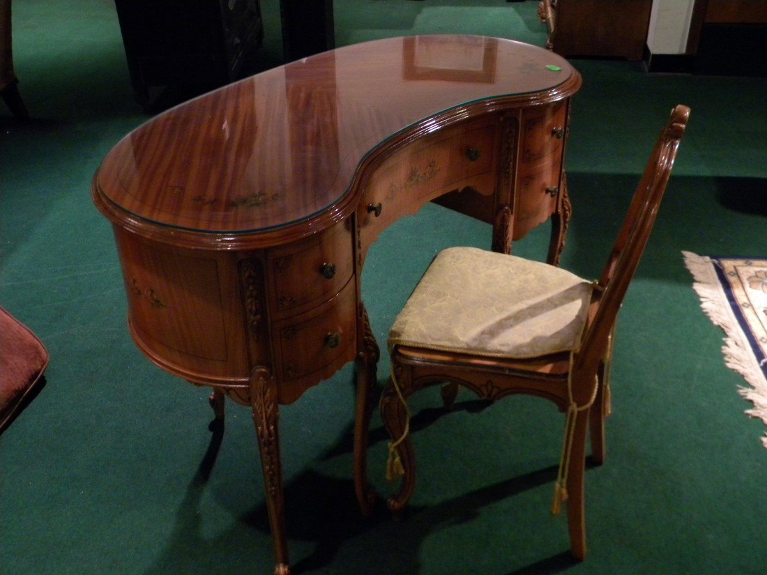 French Provincial Style Kidney-Shaped Desk & Chair: French Provincial style kidney-shaped desk with one central drawer, two small side drawers and one deep side drawer, painted roses decoration on top, skirt and drawer fronts, glass protective top and 